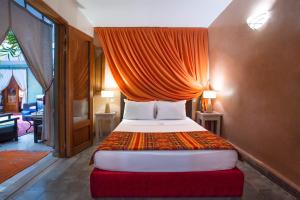 Vuode tai vuoteita majoituspaikassa Riad l'Heure d'Eté