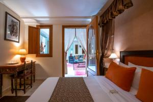 Vuode tai vuoteita majoituspaikassa Riad l'Heure d'Eté