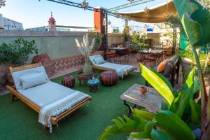Vonkajšia záhrada v ubytovaní Riad l'Heure d'Eté