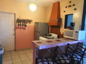 Köök või kööginurk majutusasutuses Garimar Condominios en San Carlos