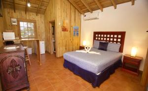 Katil atau katil-katil dalam bilik di Hotel Playa Caribe