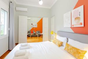 Posteľ alebo postele v izbe v ubytovaní Acropolis Apartments
