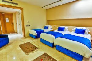 Postel nebo postele na pokoji v ubytování Hotel Cote ocean Mogador