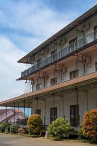a building with balconies on the side of it at Wisma Amandari in Bandar Lampung