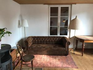 Et sittehjørne på Simple flat 72 m2 in the centre of Burgdorf with private parking