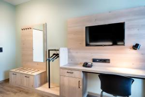 TV a/nebo společenská místnost v ubytování Hotel Sachsen-Anhalt