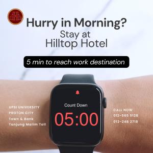 a picture of an apple watch on a wrist at Hilltop Hotel Tanjung Malim in Tanjung Malim
