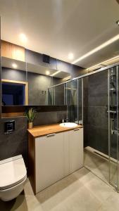 Kúpeľňa v ubytovaní Mazurski apartament