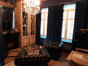A seating area at Sint Andries Suites