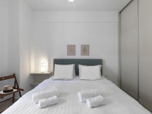 Posteľ alebo postele v izbe v ubytovaní Newly Renovated Apartment in the Heart of Athens