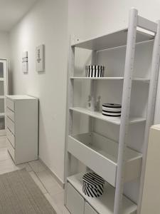 Kuchyň nebo kuchyňský kout v ubytování Stadtsuite mit Sauna in Wiener Neustadt 135 m2