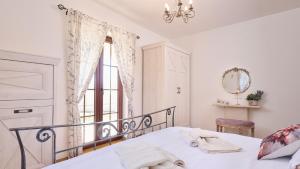 Posteľ alebo postele v izbe v ubytovaní Villa Bellissima