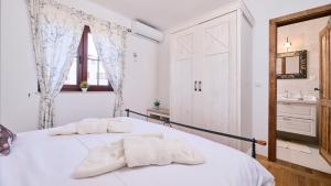 Posteľ alebo postele v izbe v ubytovaní Villa Bellissima