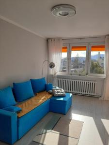 Posedenie v ubytovaní Apartament w Lądku Zdroju przy Rynku