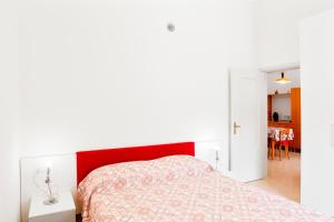Postel nebo postele na pokoji v ubytování Borghetto Pedale