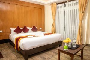 Katil atau katil-katil dalam bilik di Hotel Murano