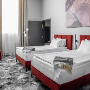 Loop Hotel Vilnius 객실 침대