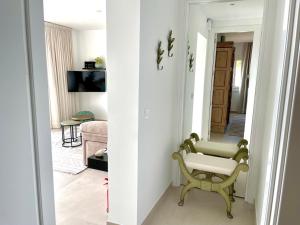A television and/or entertainment centre at Jávea Apartment Terra