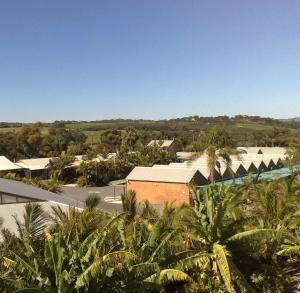 an aerial view of a resort with palm trees at McLaren Vale Motel & Apartments in McLaren Vale
