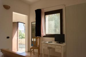 A television and/or entertainment centre at Casale Sombrino