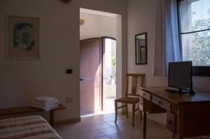 A television and/or entertainment centre at Casale Sombrino