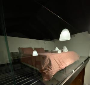 Postel nebo postele na pokoji v ubytování Lithos Villas