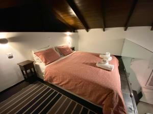 Postel nebo postele na pokoji v ubytování Lithos Villas
