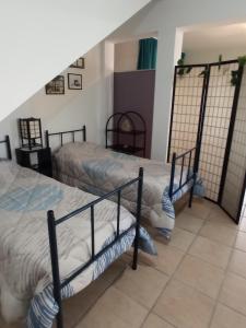 Ένα ή περισσότερα κρεβάτια σε δωμάτιο στο CASA do MONDEGO COIMBRA-17km