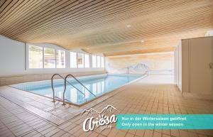 The swimming pool at or close to Rehwiesa B24 by Arosa Holiday