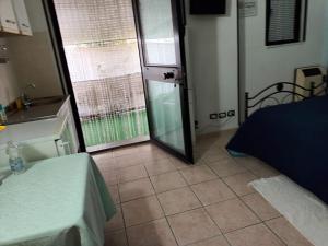 Postel nebo postele na pokoji v ubytování Il Rifugio dell'Ape Agriturismo