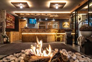 Posezení v ubytování ABINEA Dolomiti Romantic SPA