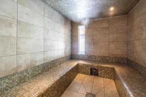 Salle de bains dans l'établissement Vacancéole - Les Ecrins d'Auris