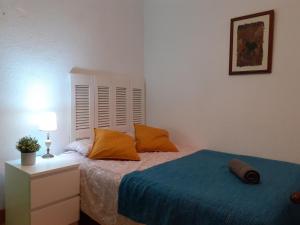 Postel nebo postele na pokoji v ubytování Beach Side Apartment