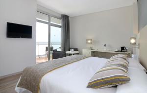 Postel nebo postele na pokoji v ubytování Medplaya Hotel Riviera - Adults Recommended