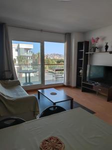 Fotografie z fotogalerie ubytování Appartement Proche Commerces avec Grande terrasse et Piscine v destinaci Roses