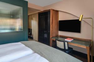 TV a/nebo společenská místnost v ubytování Boutique Hotel Seidenhof