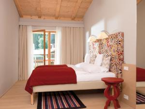 Postelja oz. postelje v sobi nastanitve Ferienwohnungen am Travel Charme Bergresort Werfenweng