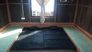 Postel nebo postele na pokoji v ubytování Limerr Resto Resort