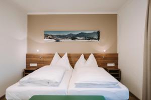Voodi või voodid majutusasutuse Hotel Aichingerwirt toas