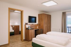 Voodi või voodid majutusasutuse Hotel Aichingerwirt toas
