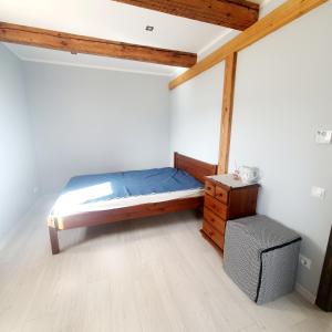Postel nebo postele na pokoji v ubytování ApartmentApsuciems