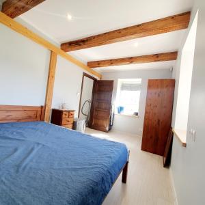 Postel nebo postele na pokoji v ubytování ApartmentApsuciems