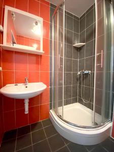 a bathroom with a sink and a shower at Elegant Apartment in Vodice - 53 m² - Near the Sea in Vodice