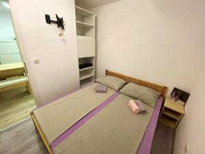 Postel nebo postele na pokoji v ubytování Modern apartment in Vodice with sea view - 48 m².