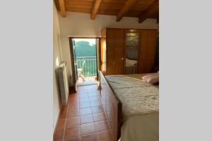 Postel nebo postele na pokoji v ubytování La Terrazza sulle Apuane