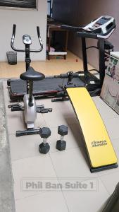 a bike on a table with a ramp and a skateboard at PhilBan Suites 1 in Ikeja