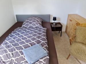 Postel nebo postele na pokoji v ubytování Ferienwohnungen Biesenthal Stadt