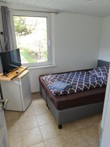 Postel nebo postele na pokoji v ubytování Ferienwohnungen Biesenthal Stadt