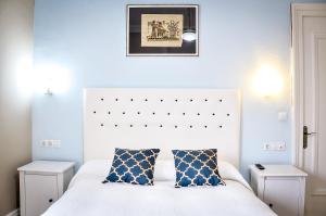Postel nebo postele na pokoji v ubytování Hotel Neguri