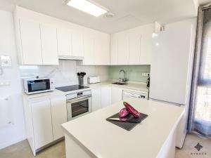 Kuchyň nebo kuchyňský kout v ubytování AVANOA - Arenal Suites Calpe + 13 fotografií